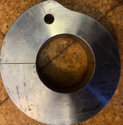 Cam wear after bearing failed. Caused problem feeding on a ST300 Stitcher.